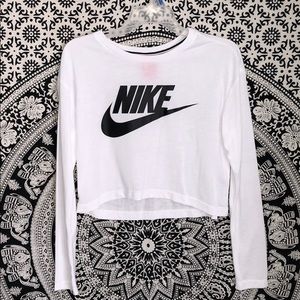 Slightly cropped, long sleeve white nike shirt